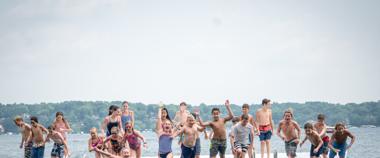 Summer camp campers enjoying the waterfront